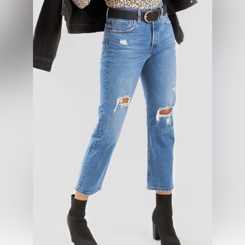 Levi’s 501. Size 29. Ankle length. Medium blue. Slightly distressed.
